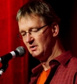 Udo Tiffert beim Poetry Slam im Dezember 2014