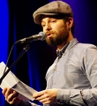 Patrick Salmen beim Poetry Slam in Erlangen im Januar 2016