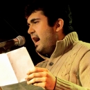 Emir Taghikhani beim Poetry Slam im März 2014