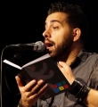 Bastian beim Poetry Slam Erlangen im November 2015