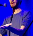 Bastian beim Poetry Slam im Oktober 2014